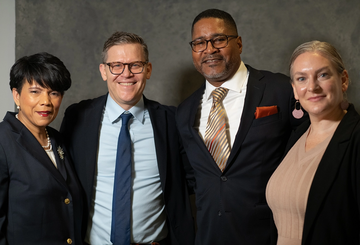 A group of ACS Commissioners and CCM senior leaders pose for a photo together.