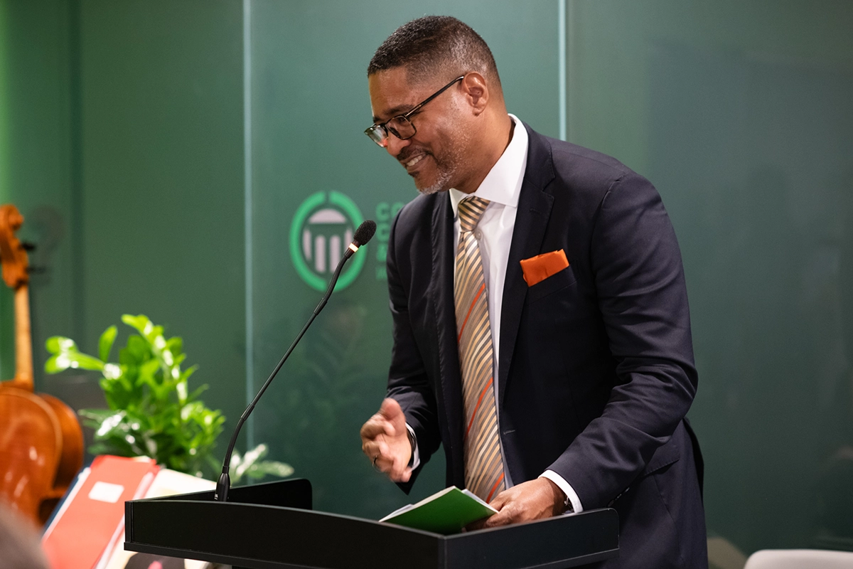 Doug Brooks, CCM's President and CEO, laughs while giving his opening remarks.
